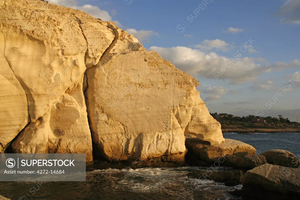 Israel, Rosh HaNikra. Rosh HaNikra is a geologic formation located on the coast of the Mediterranean Sea, in the Western Galilee near the border with Lebanon. It is a white chalk cliff face which opens up into spectacular grottos.