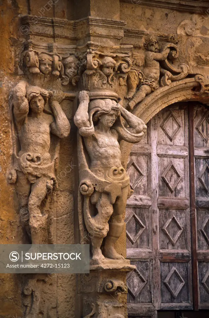 Italy, Sicily, Mazara del Vallo. Ornate doorway entrance to the Cultural Centre on Piazza Plebicito.