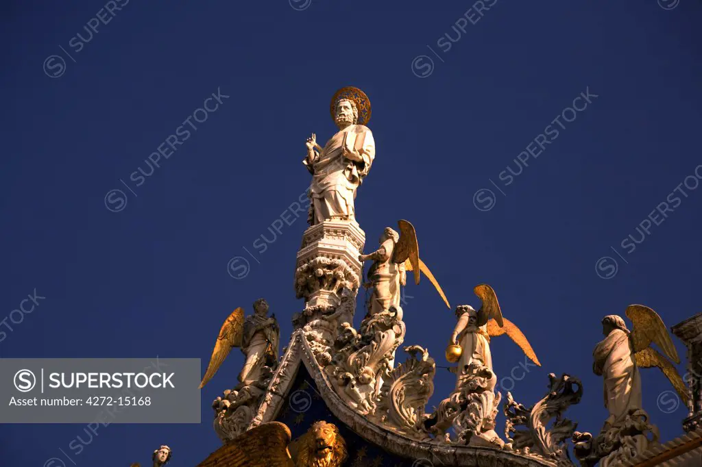 Italy, Veneto, Venice; St.Mark surrounded by archangels, on top of the Basilica di San Marco styled in Byzantine architecture.