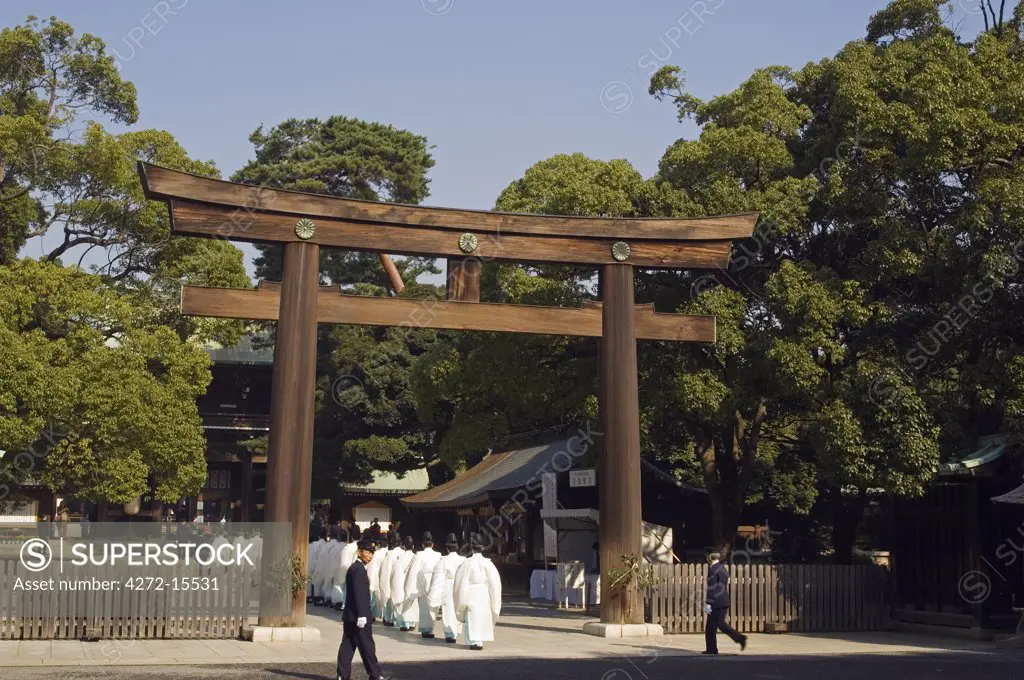 Meiji Jingu Shrine procession of temple priests under Torii Gate