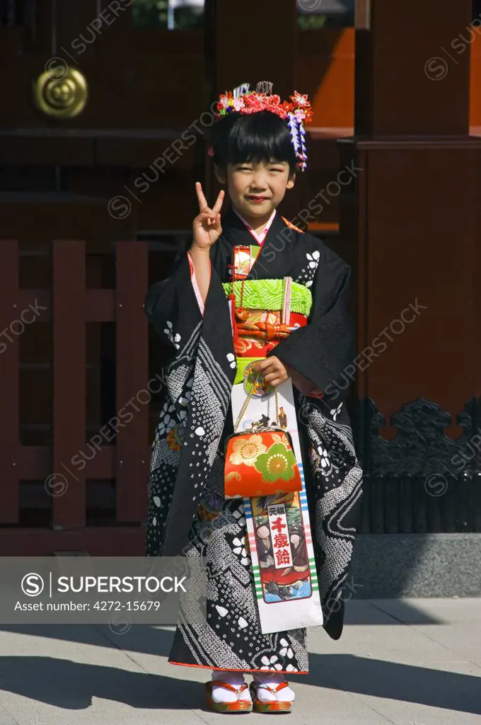 Japan, Honshu Island, Kanagawa Prefecture, Kamakura City. 7 year old girl wearing Kimono for 7-5-3 festival.