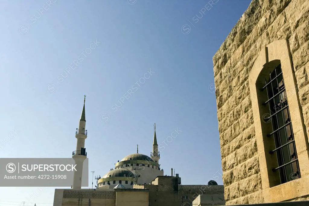 Jordan, Madaba. Located about thirty miles south of Jordans capital Amman, Madaba is famous for its Byzantine and Umayyad mosaics. The city mosque.