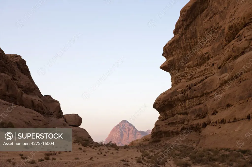 Jordan, Aqaba Region, Wadi Rum. One of the world's most spectacular desert landscapes, Wadi Rum has been a historical crossroads for Nabeatean traders heading from the Arabian Penisula, Lawrence of Arabia, and modern day adventure seekers.