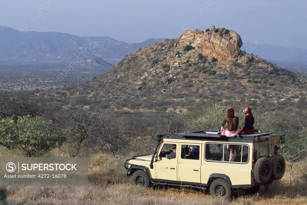 Mobile safari in Kenya with Samburu moran warriors as game spotters.
