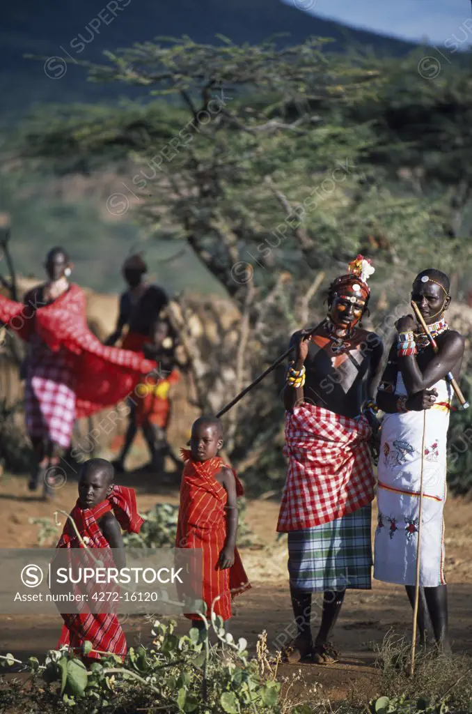 Warriors and children watch the dancing at a Laikipiak Maasai marriage near Sabuk.