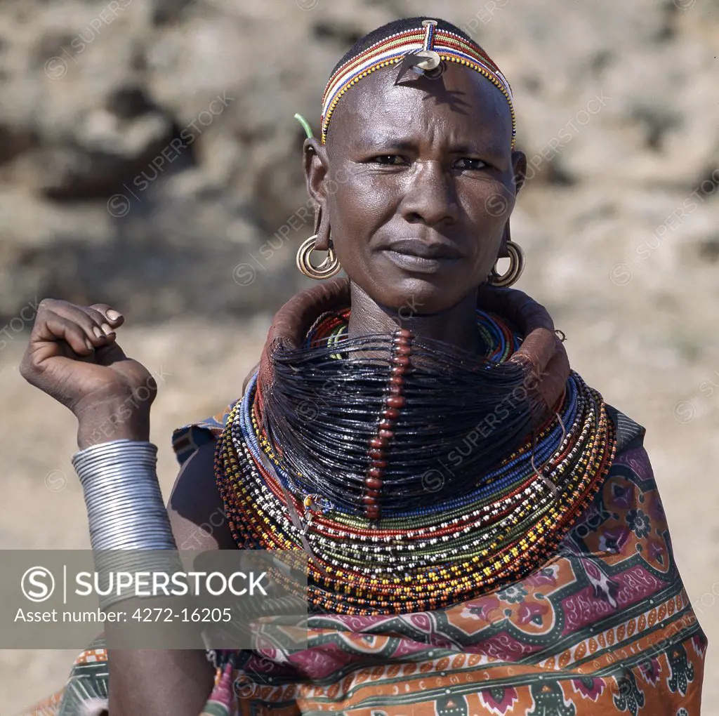 A Samburu woman wearing a mporro necklace, which denotes her married status.  These necklaces were once made of hair from giraffe tails but nowadays, the fibres of doum palm fronds are used instead.