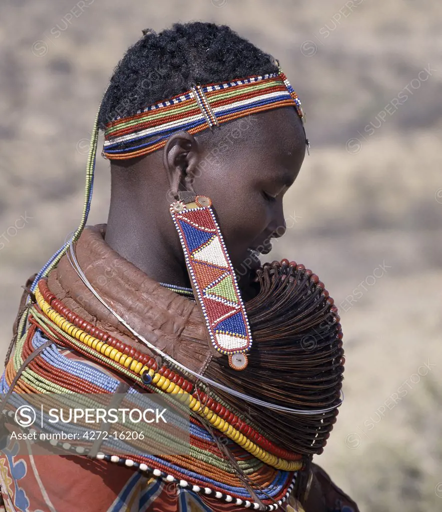 A Samburu woman wears a mporro necklace denoting her married status.  These necklaces were once made of hair from giraffe tails but nowadays, the fibres of doum palm fronds are used instead.