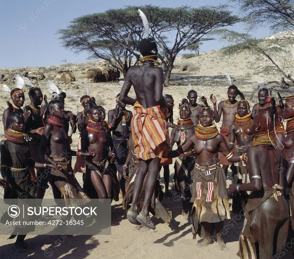 Song is an art form ingrained in Turkana culture.  At the end of a dance session, the participants invariably enjoy the Song of the Bulls. Each young man will take centre-stage to extol the praises of his favourite ox. He will explain how it came into his possession, its distinguishing traits and with outstretched arms, imitate the shape of its horns.