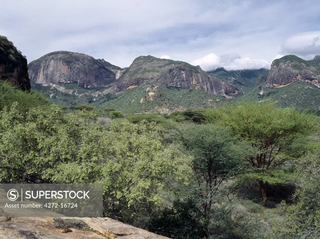 Sheer rock faces of the impressive Ndoto Mountains near Ngurunit in Samburuland. The region is home to the Samburu people of Northern Kenya who are a semi-nomadic pastoral community related to their more famous cousins