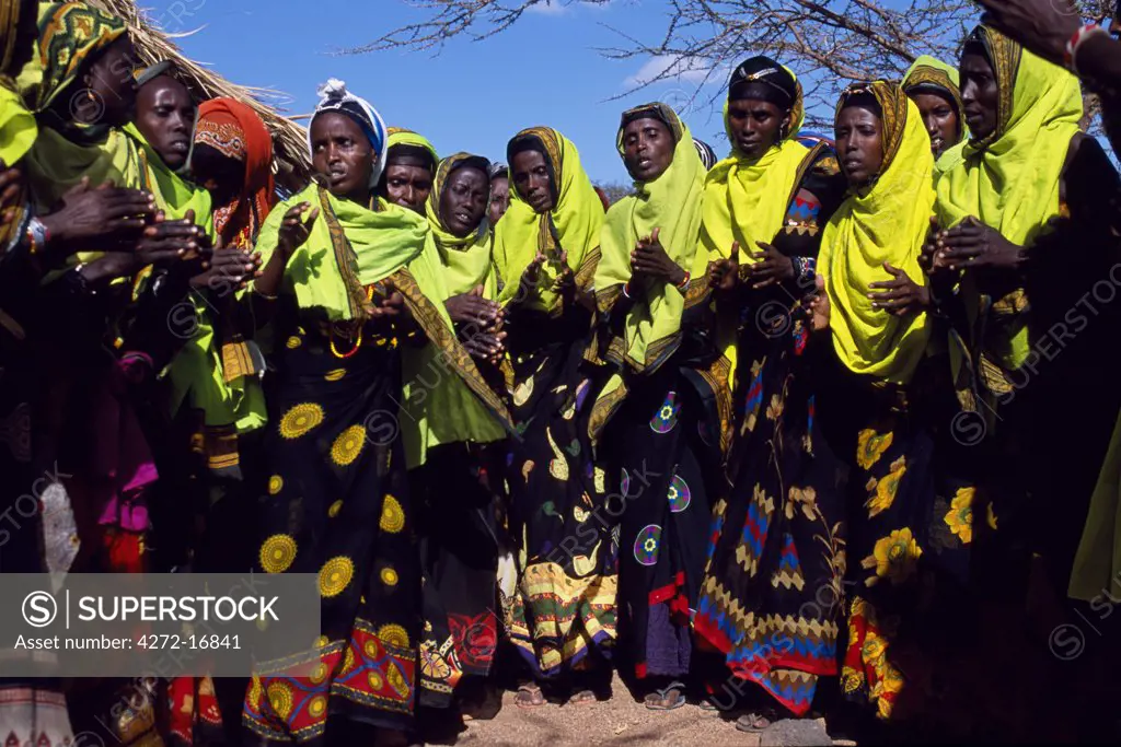 Gabbra women dance at a gathering in the village of Kalacha.  The Gabbra are a Cushitic tribe of nomadic pastoralists living with their herds of camels and goats around the fringe of the Chalbi Desert.