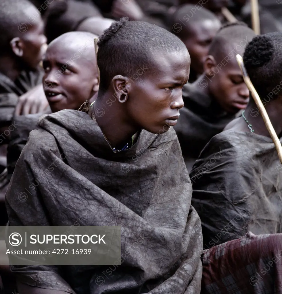 In the weeks leading up to their circumcision, Samburu boys must wear charcoal blackened cloaks, which are made from three goatskins by their mothers.