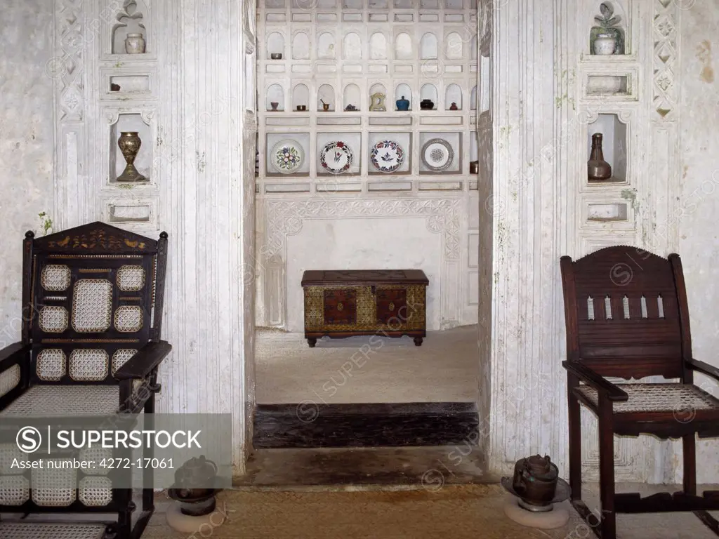 A fine example of the interior of a traditional Swahili house in Lamu Town. The extraordinary skill of the local craftsmen is an important legacy of Afro Arab architecture in the Swahili style.