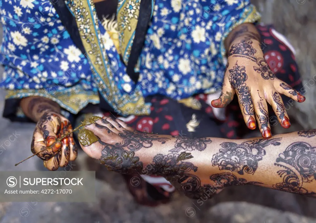 Lamu women are expert in intricate hand and body designs using henna and other dyes.   Henna stains skin an orange-red hue and its thick brownish paste must not be removed for at least an hour after application. Situated 150 miles north northeast of Mombasa, Lamu town dates from the 15th century AD.