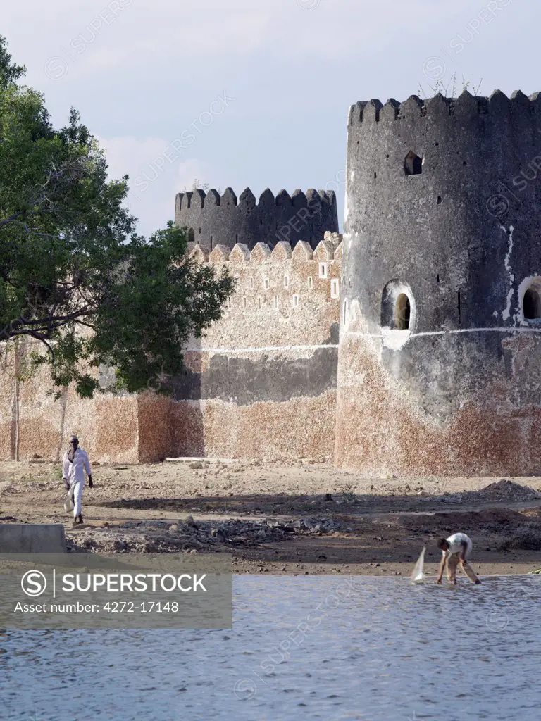 Siyu Fort. The Sultan of Zanzibar in the middle of the 19th century built this impressive fort at the end of the mangrove lined tidal channel leading to Siyu village on Pate Island. The fort is now undergoing extensive repairs after years of neglect.