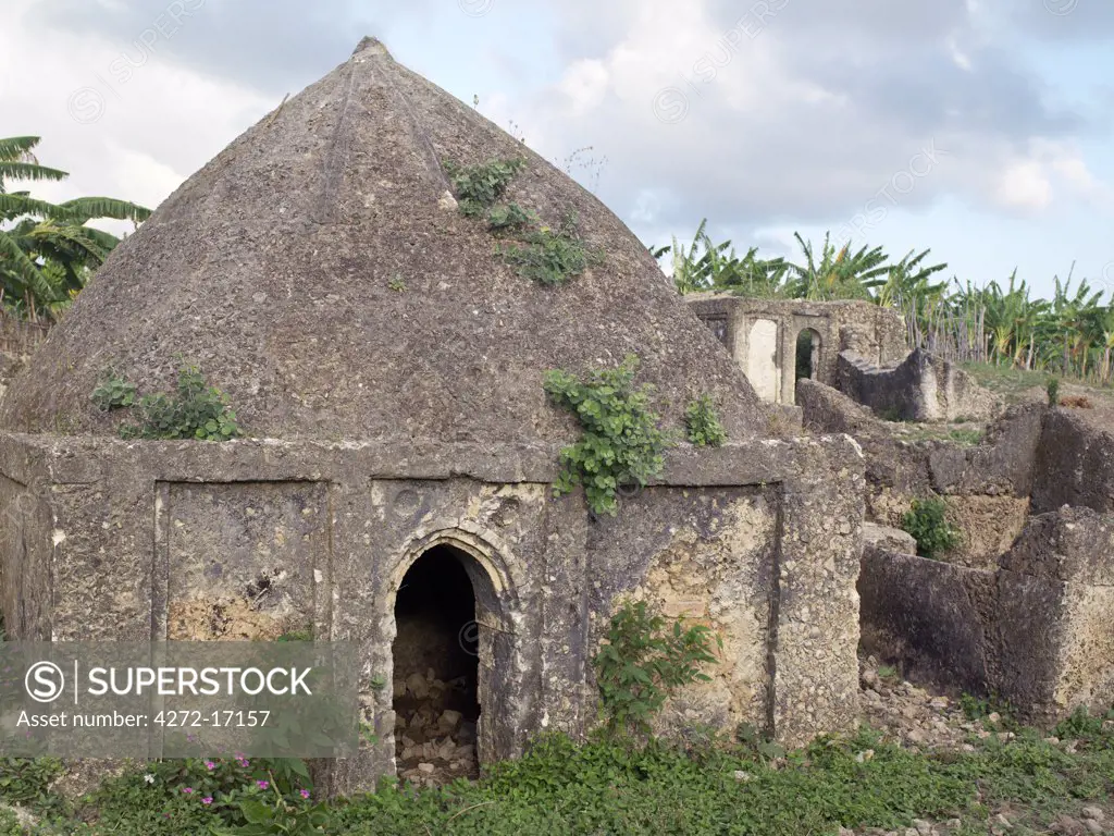 The 17th century tomb of Mwenya Bunu among ruins on the outskirts of modern Pate Village.  All the buildings in Pate were constructed of coral rag. Pate was established by Arabs from Arabia in the 13th century, or possibly earlier.