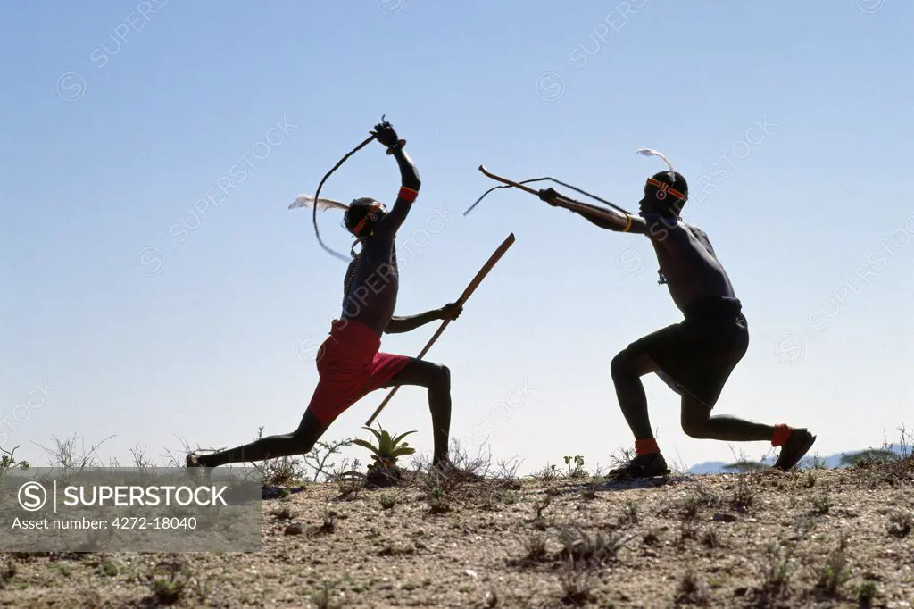 Turkana men fight with rawhide whips and sticks either to settle disputes or to test their courage and ability to withstand pain.