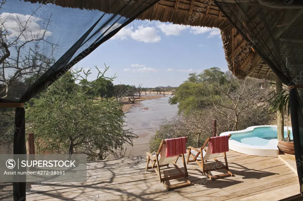Kenya, the sun deck and pool of a bedroom in the luxurious Sasaab Lodge situated on the banks of the Uaso Nyiru River