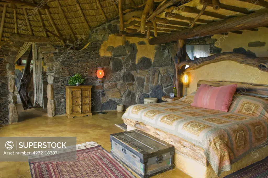 Kenya, Laikipia, Ol Malo.  Bedroom of one of the six suites at Ol Malo House, a private Bush Home.
