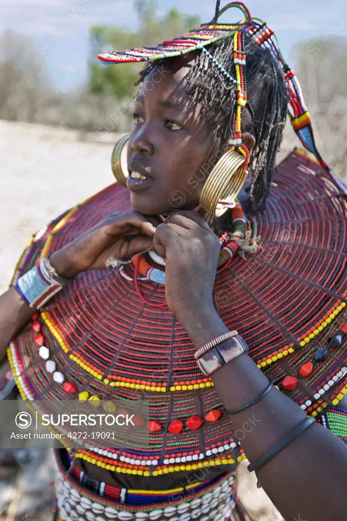 A Pokot woman wearing the traditional beaded ornaments of her tribe which denote her married status. The Pokot are pastoralists speaking a Southern Nilotic language.