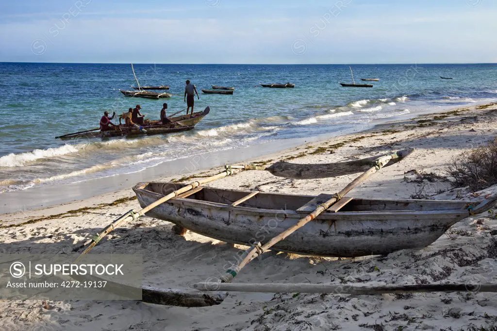 In the late afternoon, fishermen prepare to leave Msambweni beach, south of Mombasa, for a nights fishing beyond the coral reef.