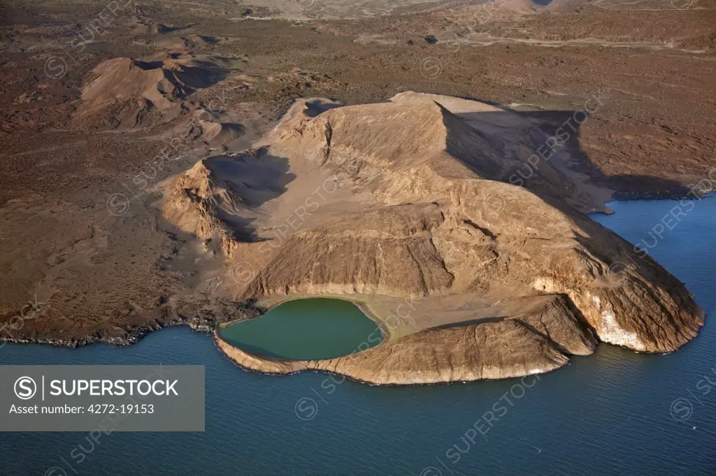 An extinct volcanic crater, Abil Agituk, at the southern end of Lake Turkana has a distinctively green crater lake which is fed by underground seepage from the main lake.