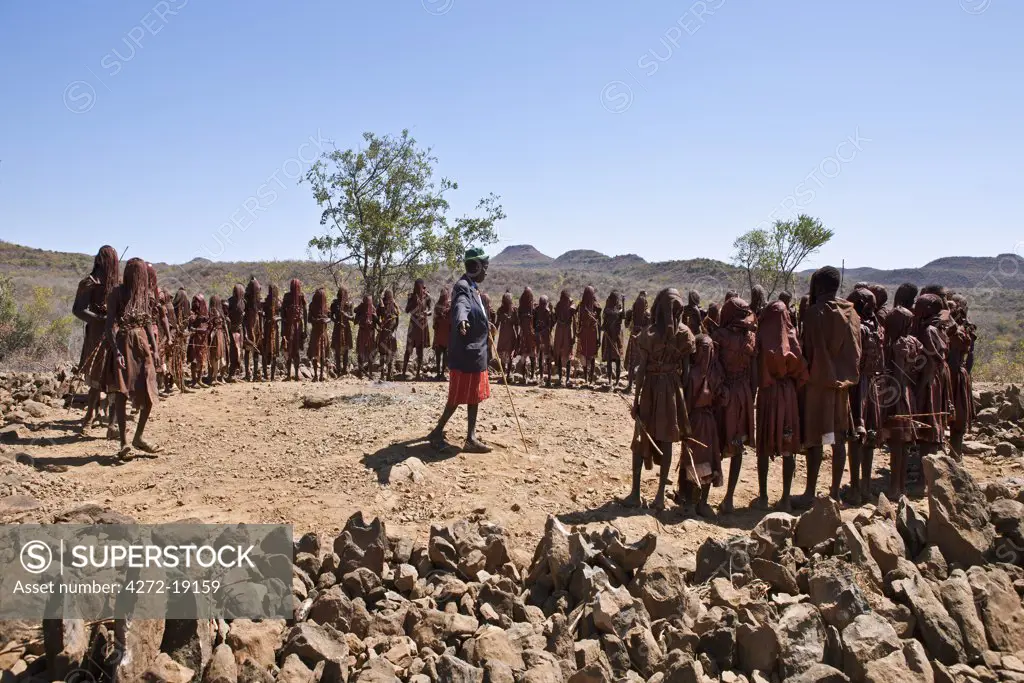 For two to three months after their circumcision, Pokot boys sing and dance in a special seclusion camp while undergoing instruction from tribal elders.  During this time, they must wear goatskins, conceal their faces with masks made from wild sisal (sansevieria) and carry bows with blunt arrows.