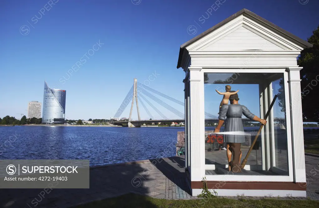 Sculpture of Big Christopher (Legend of Riga) on banks of Daugava River, Riga, Latvia