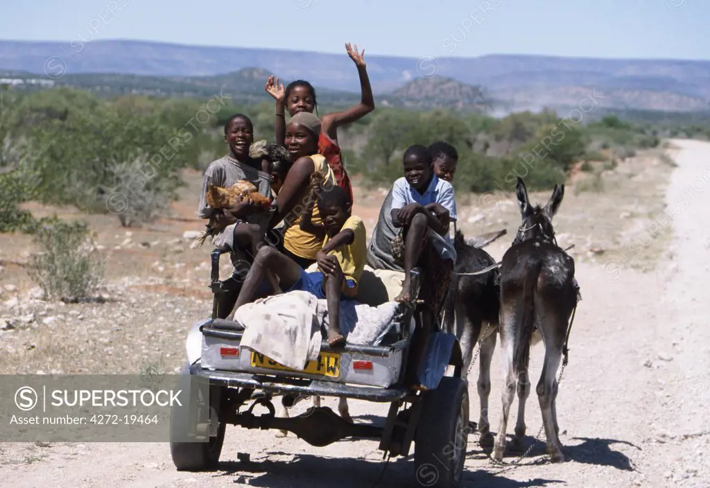 Children on donkey cart.