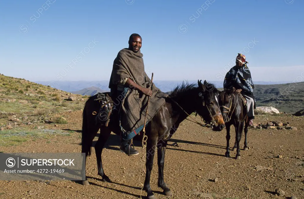 Basutho pony and horseman on high pass.