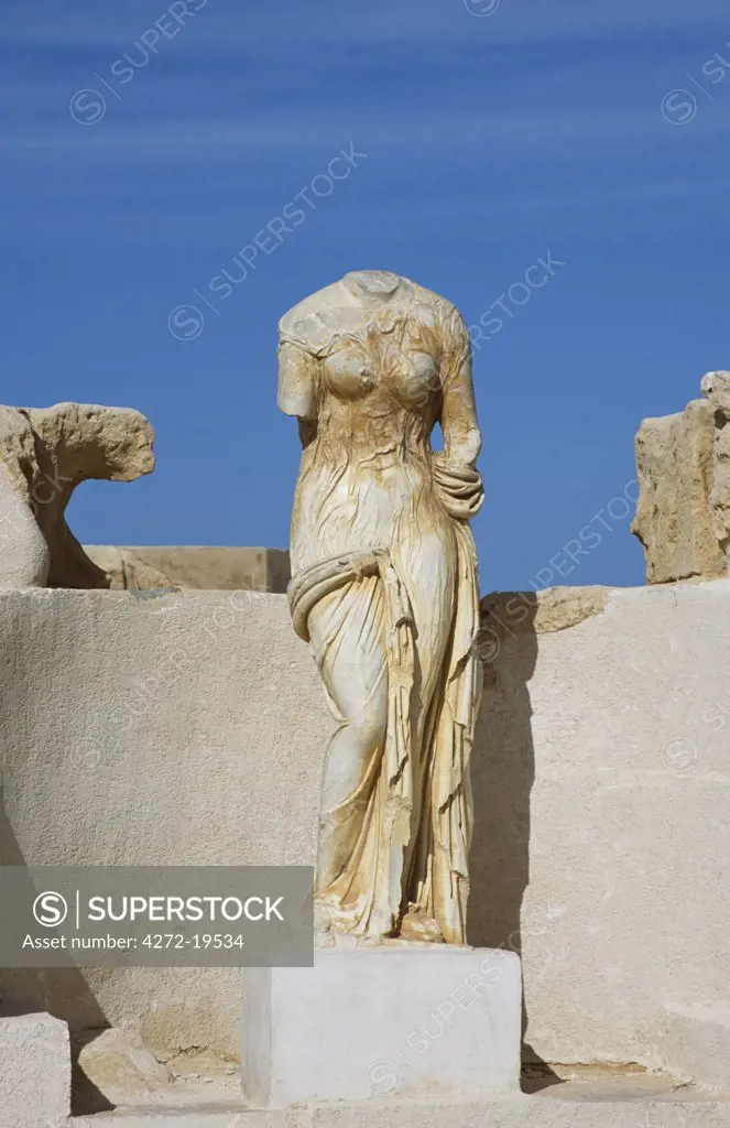 A statue of a woman in the Forum Baths at the ancient Roman city of Sabratha.