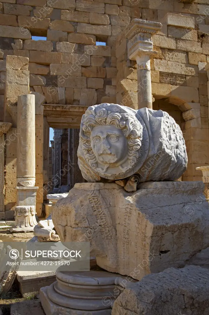 Example of one of the marble Gorgan heads, originally set on the facades between the arches on the colonnaded porticoes in the Severan Forum, Leptis Magna, Libya