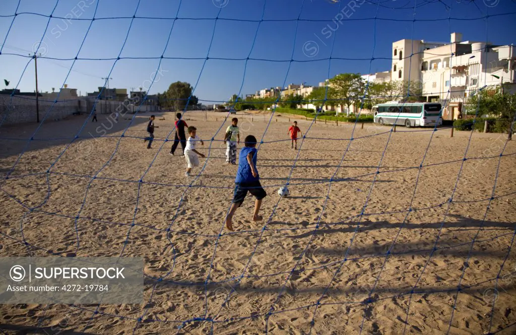 Tripoli, Libya; Children during a football match in the outskirts of the city