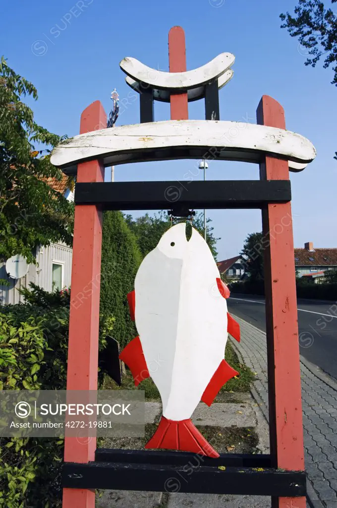 Lithuania, Curonian Spit, Juordkrante. A shop sign advertising fresh fish for sale.