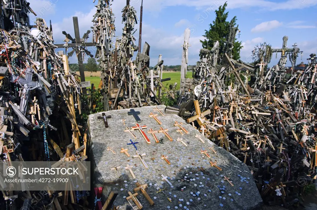 Lithuania, Hill of Crosses (Kryziu Kalnas). Thousands of memorial crosses are layed over the hill in a tradition of planting crosses since the 14th Century.