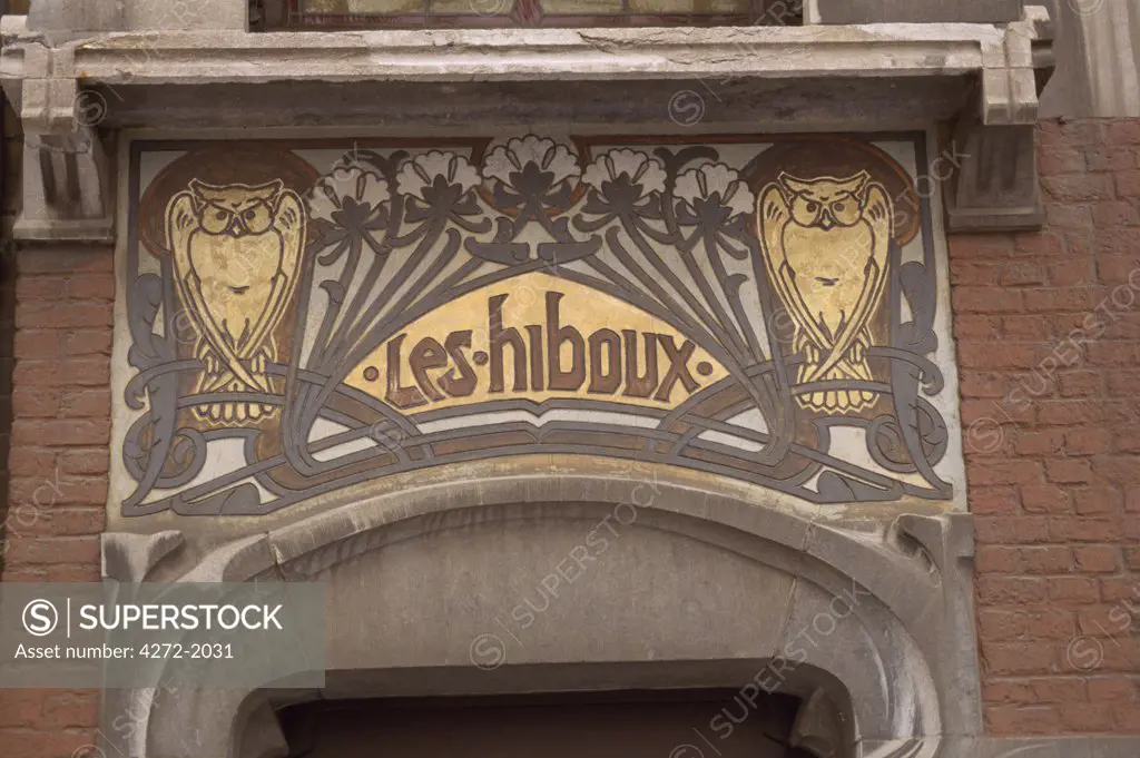 Art nouveau motif above a door of a house.