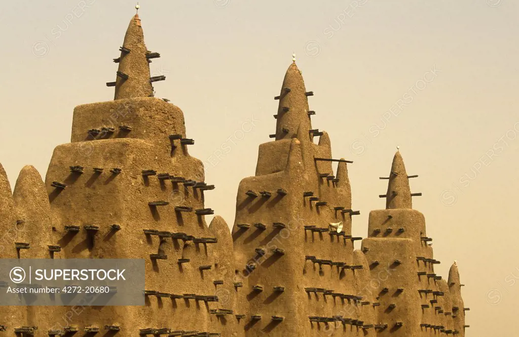 Mali, Djenne. The celebrated Mosque of Djenne, or Grande Mosquee, one of Africa's most striking mud brick buildings with towers topped by ostrich eggs.
