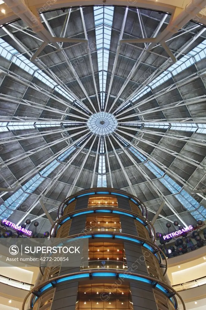 Malaysia, Melaka, Kuala Lumpur, Kampong Dollah, the interior lift shaft of the Kulala Lumpur, City Centre (KLCC) shopping centre.