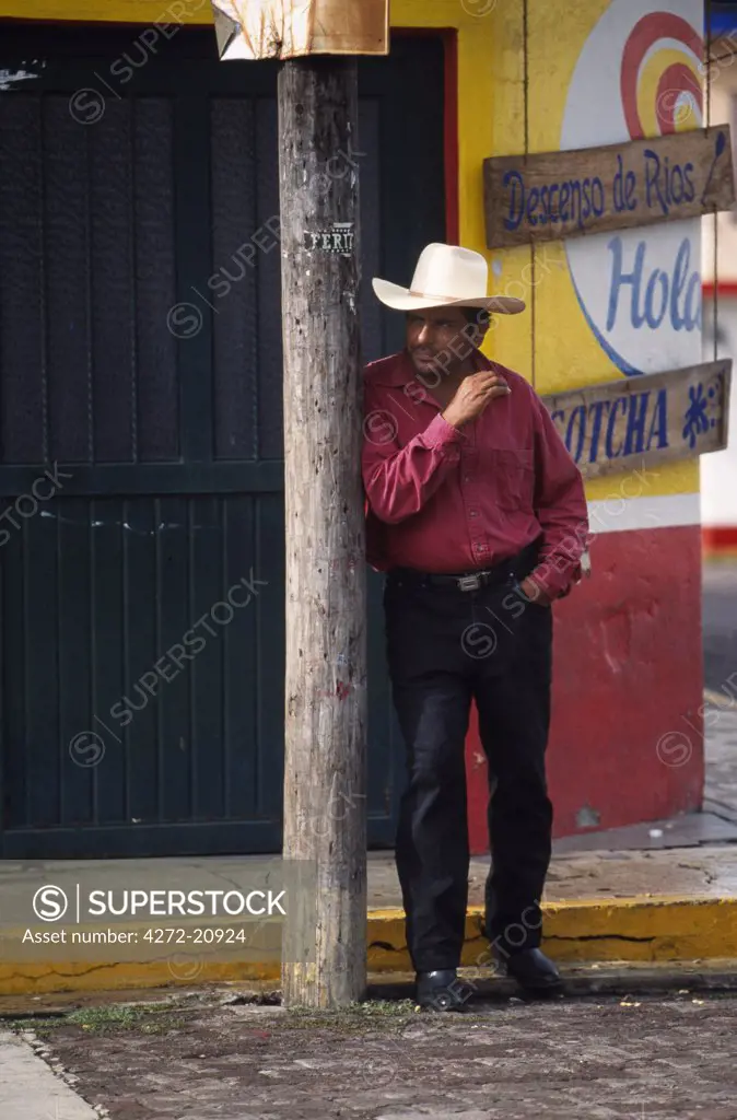 Cowboy on street corner in Jalcomulco.