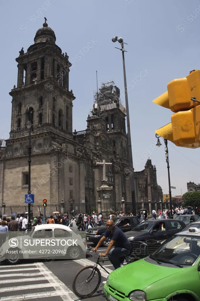 Mexico, Mexico City. The Cathedral Metropolitana, one of the largest cathedrals in the Western Hemisphere. It was constructed in the Spanish Baroque style of architecture and includes a pair of 64-meter neoclassical towers which hold 18 bells.