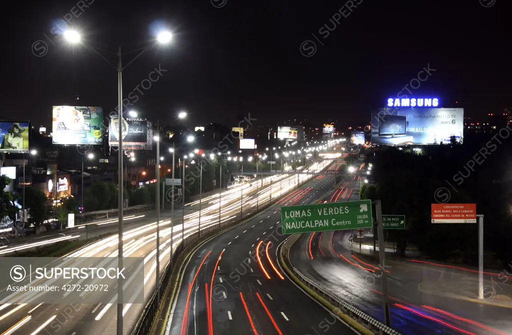 Mexico, Mexico City. The Boulevard Periferico at The Torres de Satalite (Satelite Towers), urban sculptures located in Ciudad Satalite (Satellite City), a middle class zone, in the northern part of Naucalpan, Mexico City.