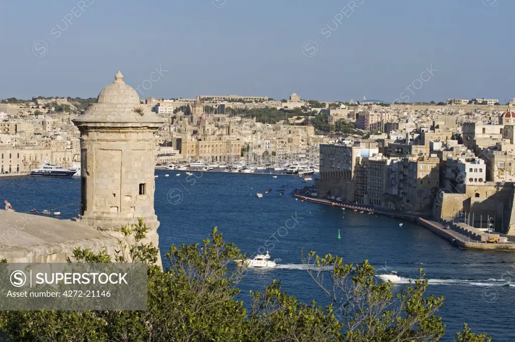 Malta, Valletta. A medieval sentry post built on to the great defensive walls surrounding Valletta looks out over the Grand Harbour towards Vittoriosa.
