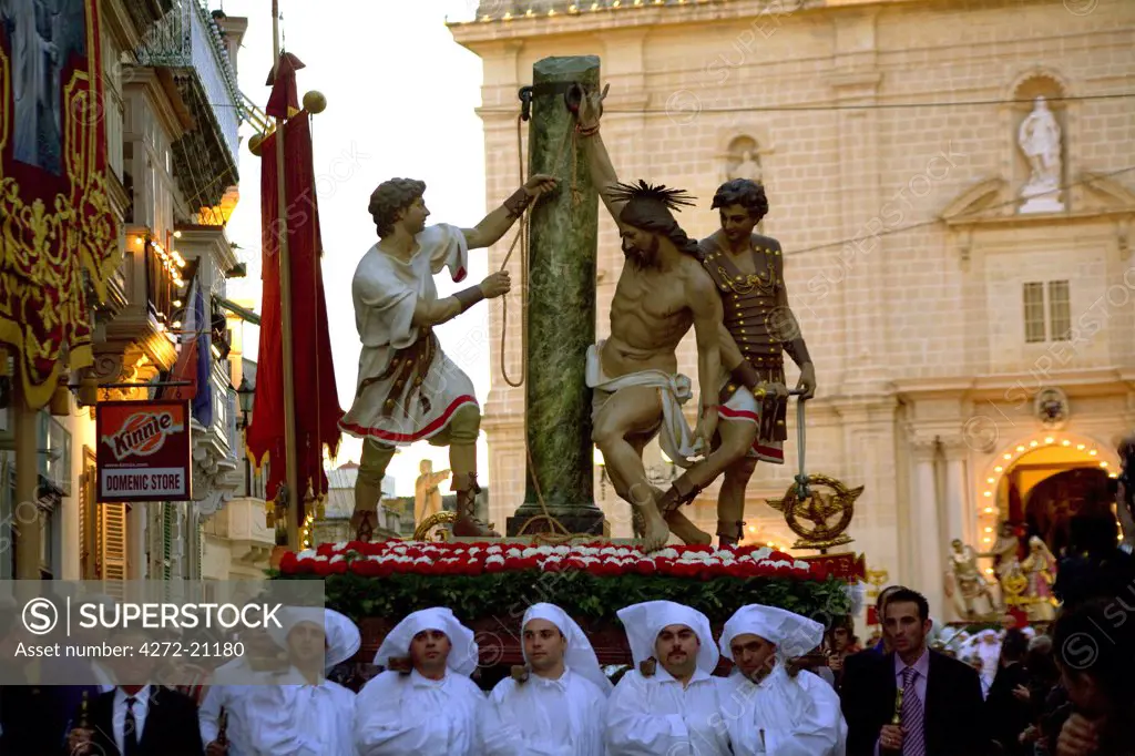 Europe, Malta, Qormi; A Statue showng Christ's flagellation, carried during the procession for Good Friday