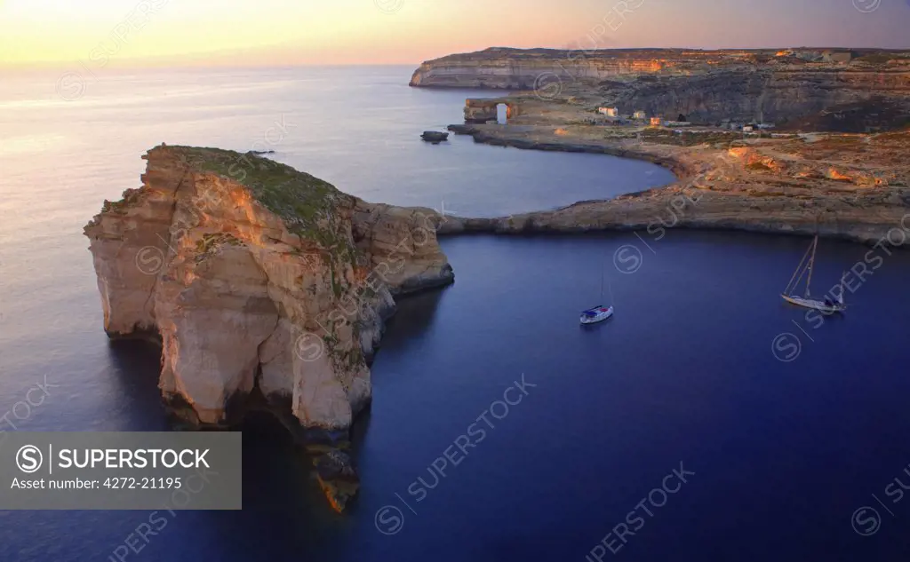 Malta, Gozo, Dwejra; 'Fungus Rock' Named so, because of the plant growing on it.