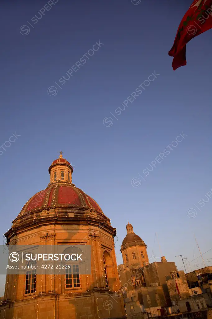 Malta, Vittoriosa; Church cupolas at Vittoriosa decorated for the feast of patron Saint Lawrence