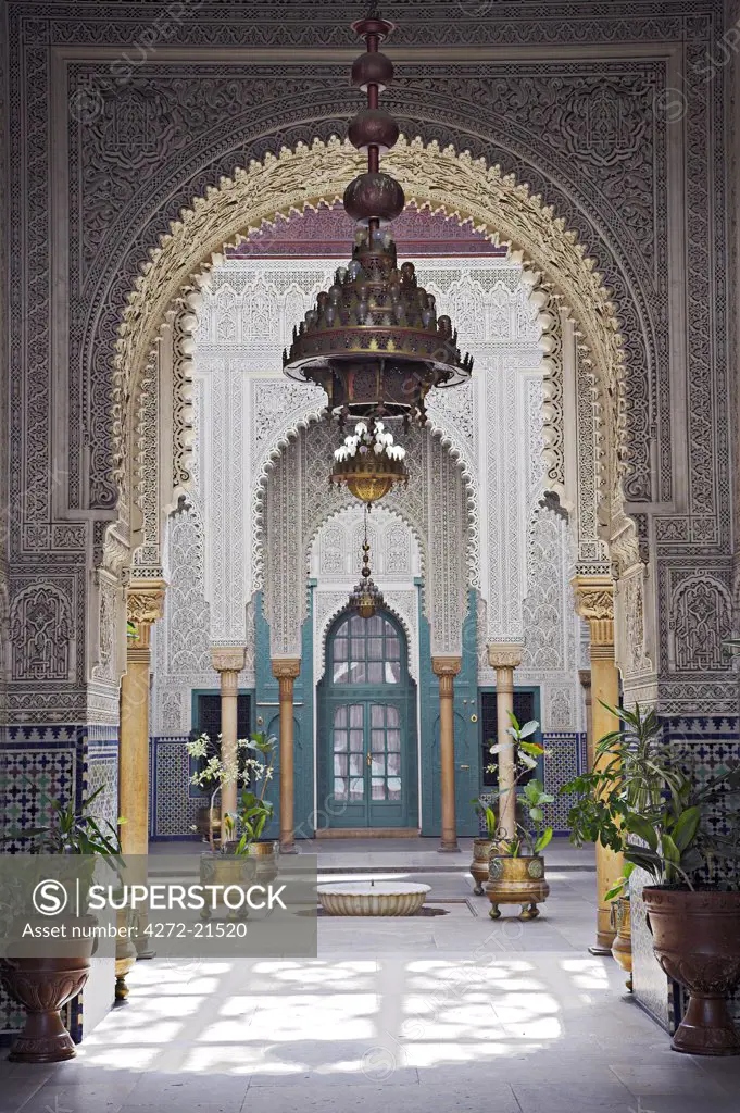 The interior of the Mahakma du Pasha in the Quartier Habous or 'New Medina' in Casablanca. The building was once a palace and  law courts but is now a police prefecture. It has over 60 rooms decorated with carved wooden ceilings, stuccos and stone floors.
