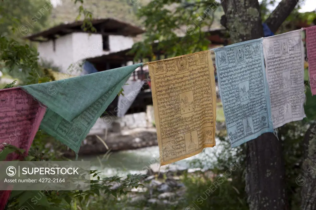 Prayer flags blowing in the wind in Bhutan