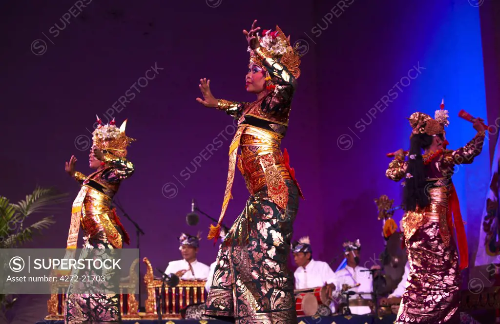 Morocco, Fes. The group Panti Pusaka Budaya from Indonesia perform the Dance of the Feminine Court on the stage of the Bab Makina in Fes during the Festival of World Sacred Music. Dancers: Ni Wayang Eka Rahmayuni, Ni Kadek Yuni Warnaningsih, Ni Putu Putri Setyari.