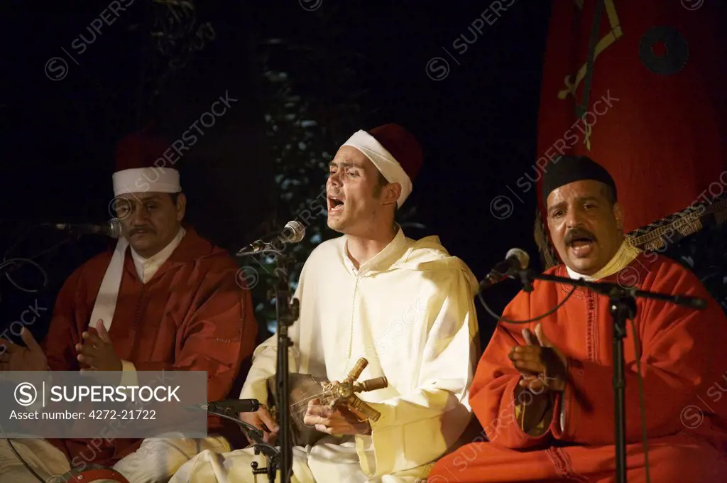 Morocco, Fes. The Hamadchas Brotherhood with Frederic Calmes perform at the Dar Tazi during the Fes Festival of World Sacred Music.