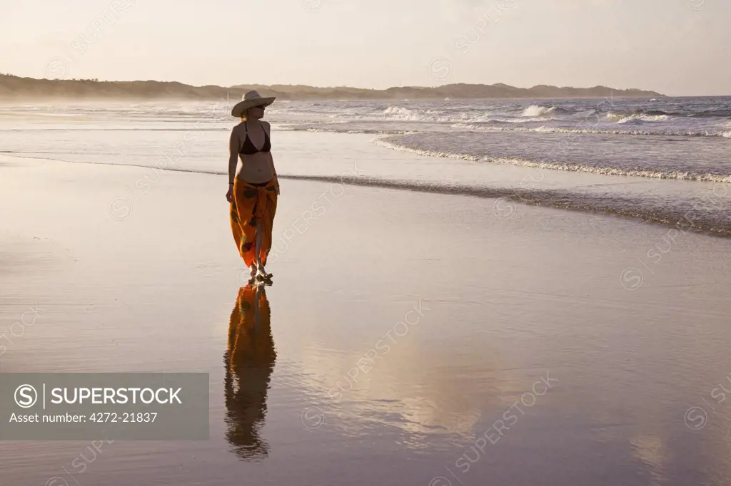 Young woman on Tofo Beach near Inhambane in southern Mozambique.