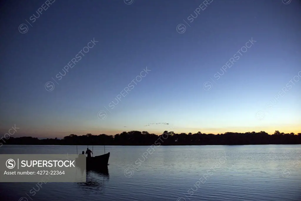 Malawi, Upper Shire Valley, Liwonde National Park.  Early morning sunrise over the Shire River.